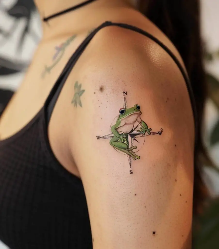 Frog and compass tattoo
