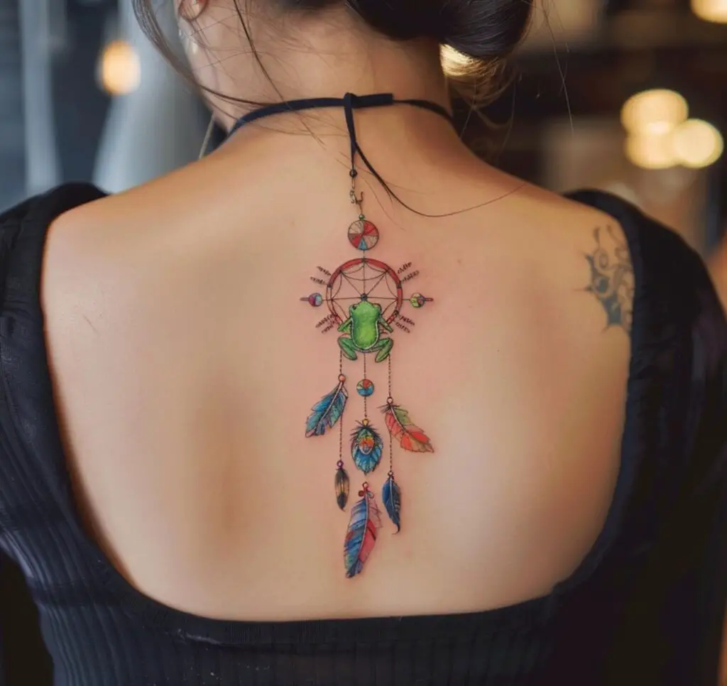 Frog and feather dreamcatcher tattoo