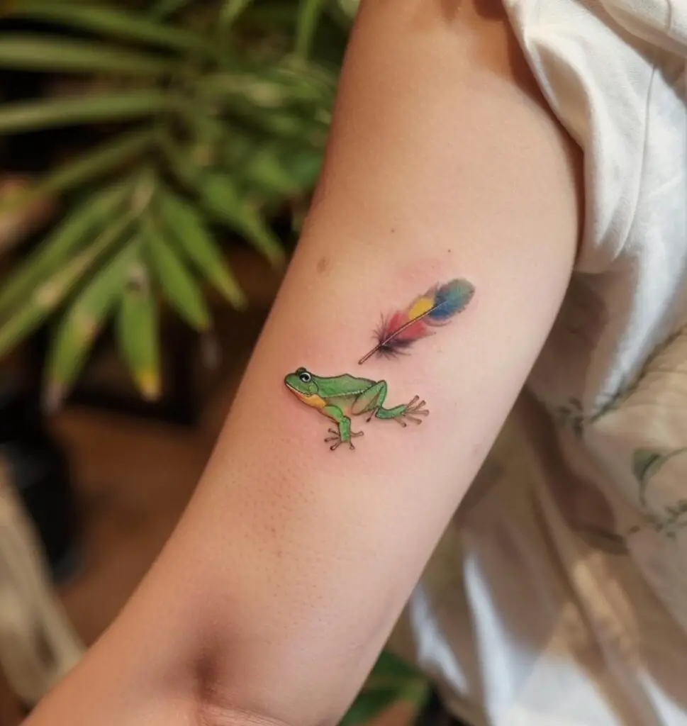 Frog with feather tattoo