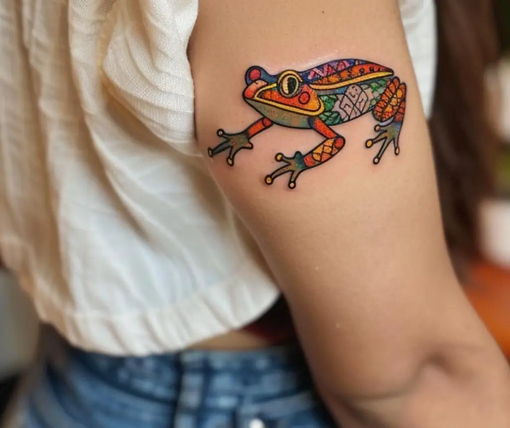 Frog with tribal patterns tattoo